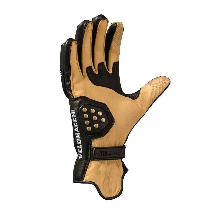 Patterned fourchettes between the glove fingers provides better dexterity while on a motorcycle.