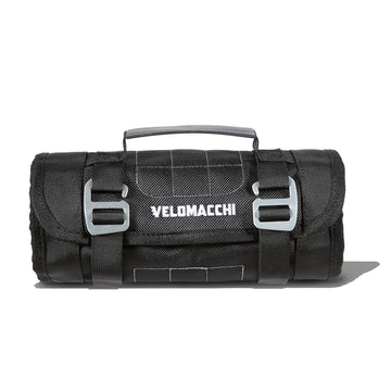 A motorcycle tool-roll reinforced ballistic quilted shell.